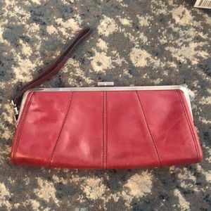 Red Kenneth Cole Reaction clutch